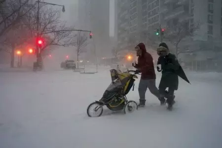 stroller in snowstorm